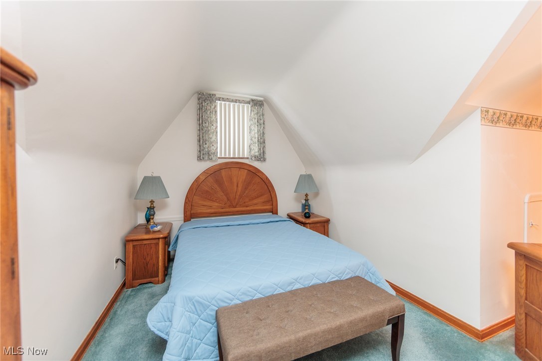 6192 Stanbury Road Parma, OH 44129 - Photo 37 of 49 Bedroom featuring vaulted ceiling and carpet