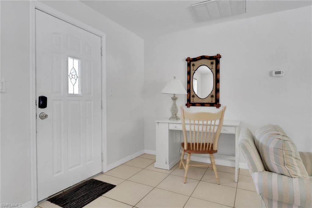 2772 Riverview Drive Naples, FL 34112 - Photo 8 of 23 a view of a room with furniture
