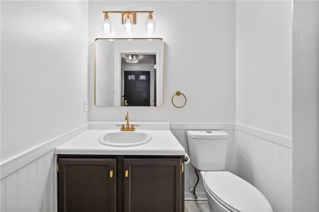 259 Quail Run Road Venetia, PA 15367 - Photo 8 of 50 First floor powder room adjoining entrance foyer.