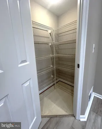 a bathroom with a sink toilet and mirror