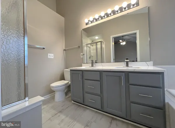 an empty room with a mirror