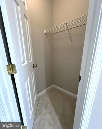 a bathroom with a sink a toilet a tub and shower