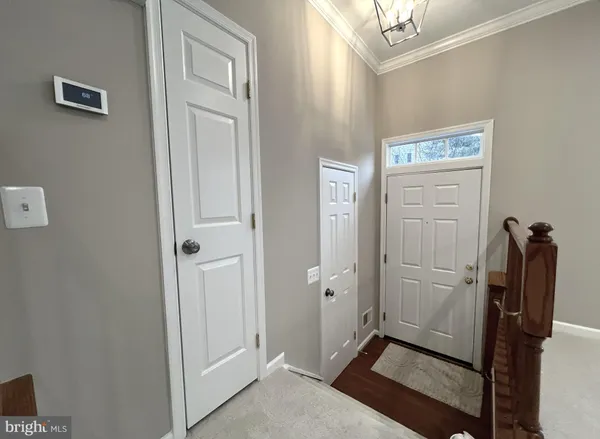 a view of a livingroom with a staircase