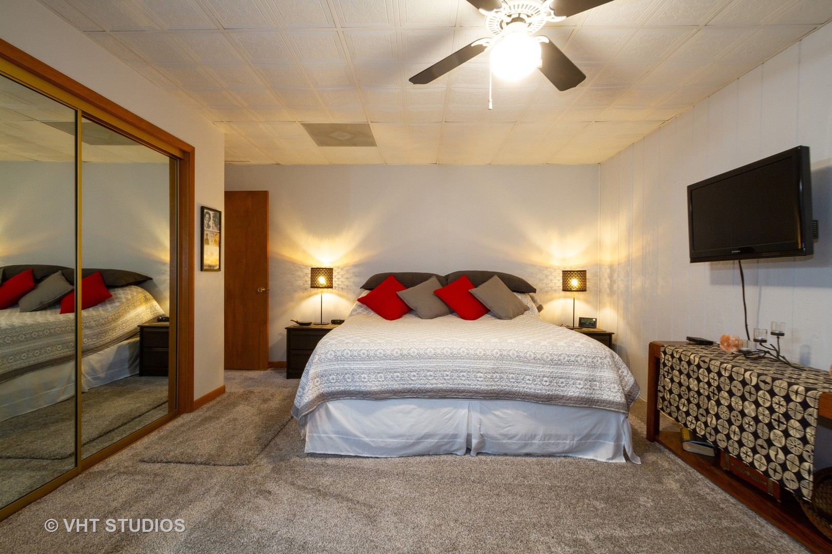 514 Windsor Road Loves Park, IL 61111 - Photo 11 of 33 a bedroom with a bed and a flat screen tv