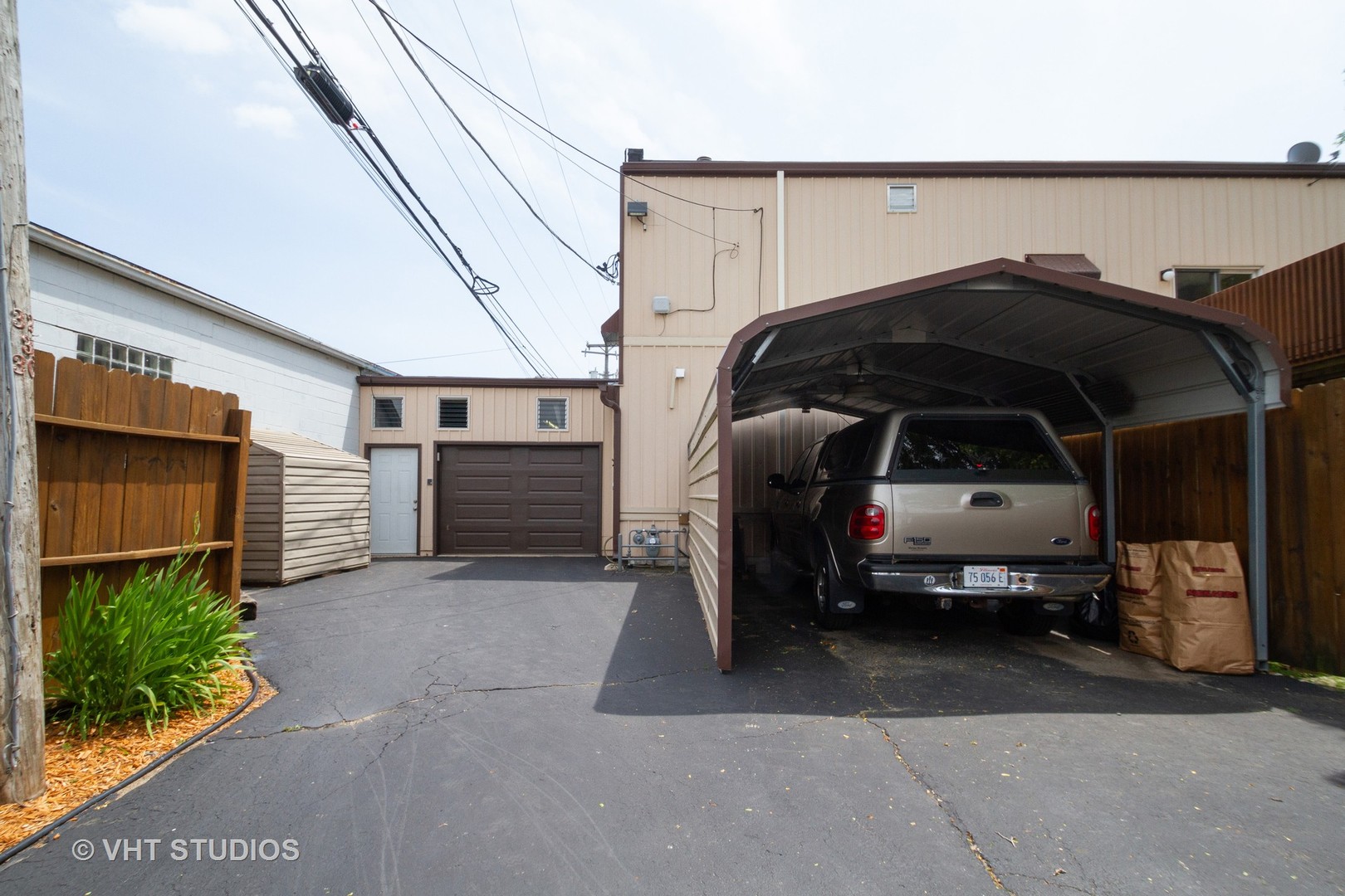 514 Windsor Road Loves Park, IL 61111 - Photo 4 of 33 a view of car parked in garage