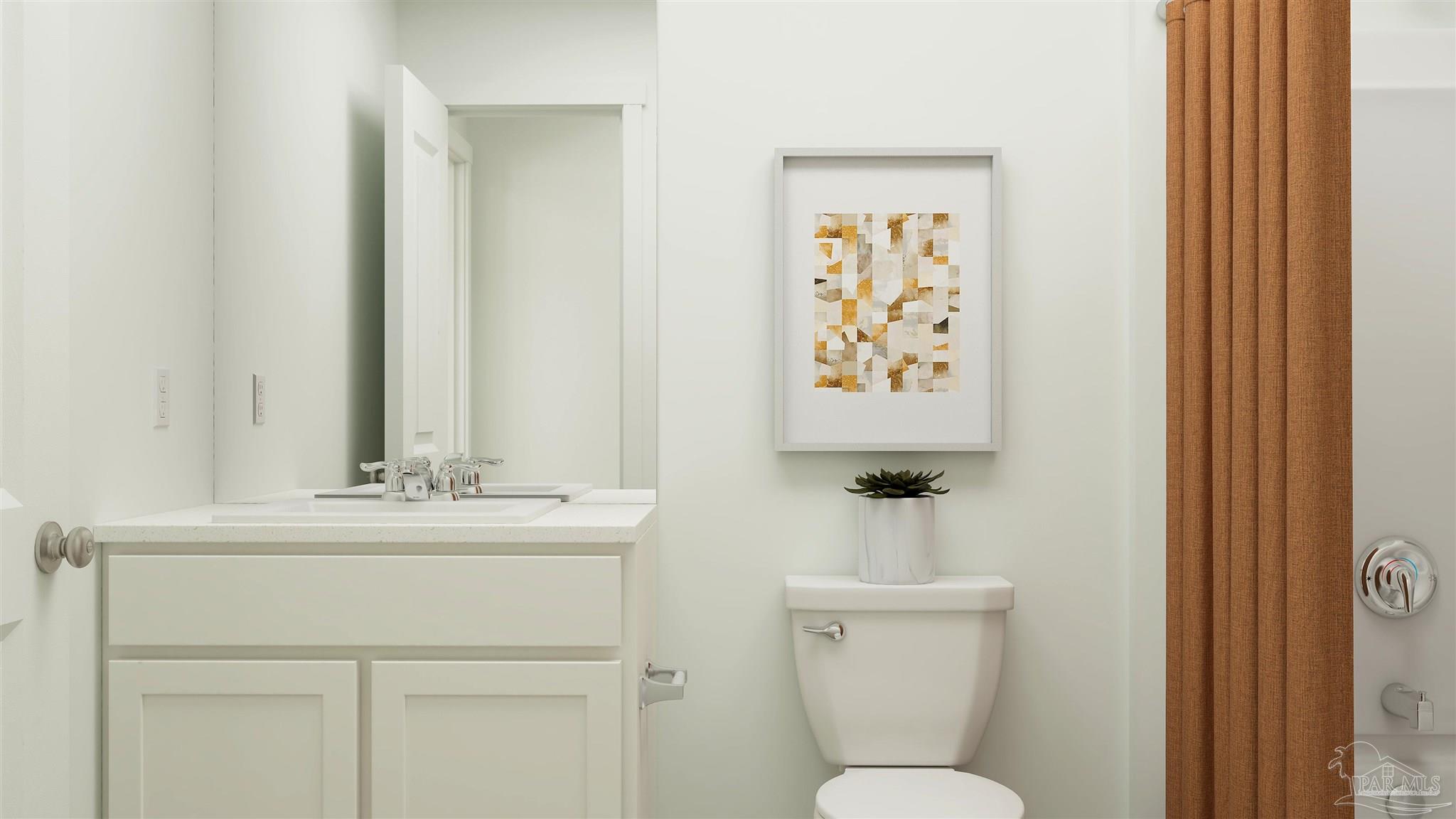 6513 Buckthorn Circle Pace, FL 32571 - Photo 14 of 22 a bathroom with a toilet sink and mirror