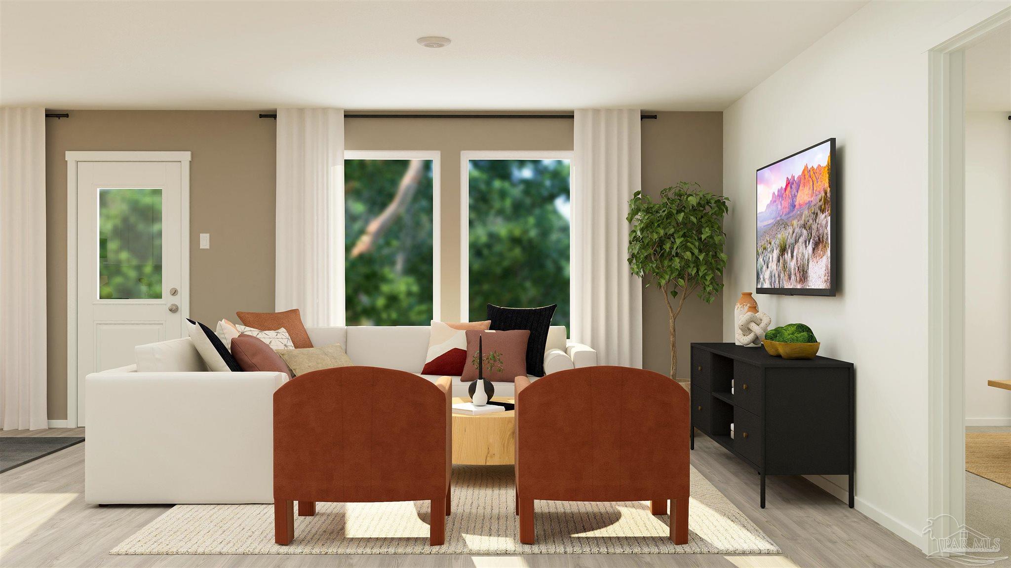 6513 Buckthorn Circle Pace, FL 32571 - Photo 4 of 22 a living room with furniture and a window