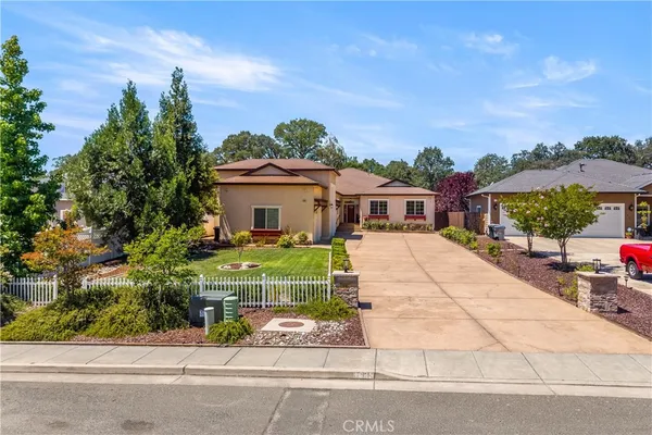a house with trees in the background
