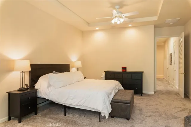 a bathroom with a toilet a sink and a mirror