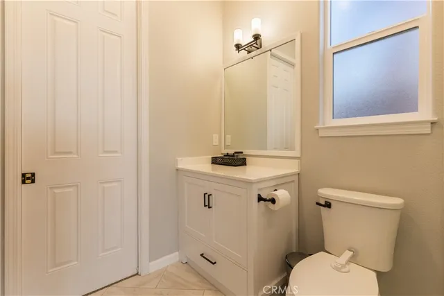 a patio with patio a couch and wooden floor