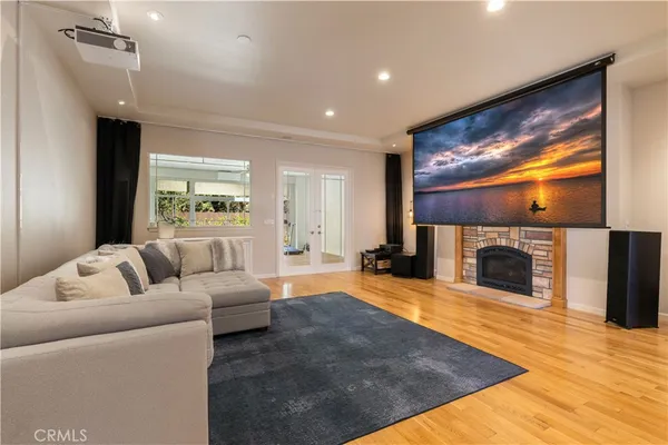 a living room with furniture and a rug