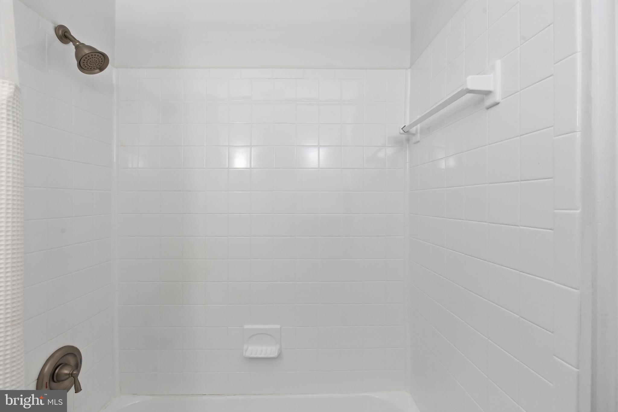 6801 Adelphi Road University Park, MD 20782 - Photo 14 of 26 Tub with shower.