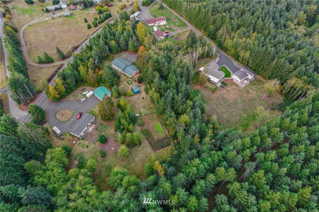 491 South Military Road Winlock, WA 98596 - Photo 39 of 40 an aerial view of a house with a yard and garden