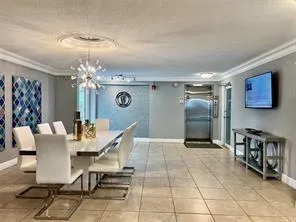 a view of a dining room with furniture