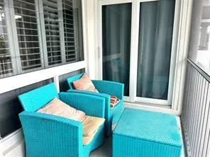 a backyard of a house with seating space