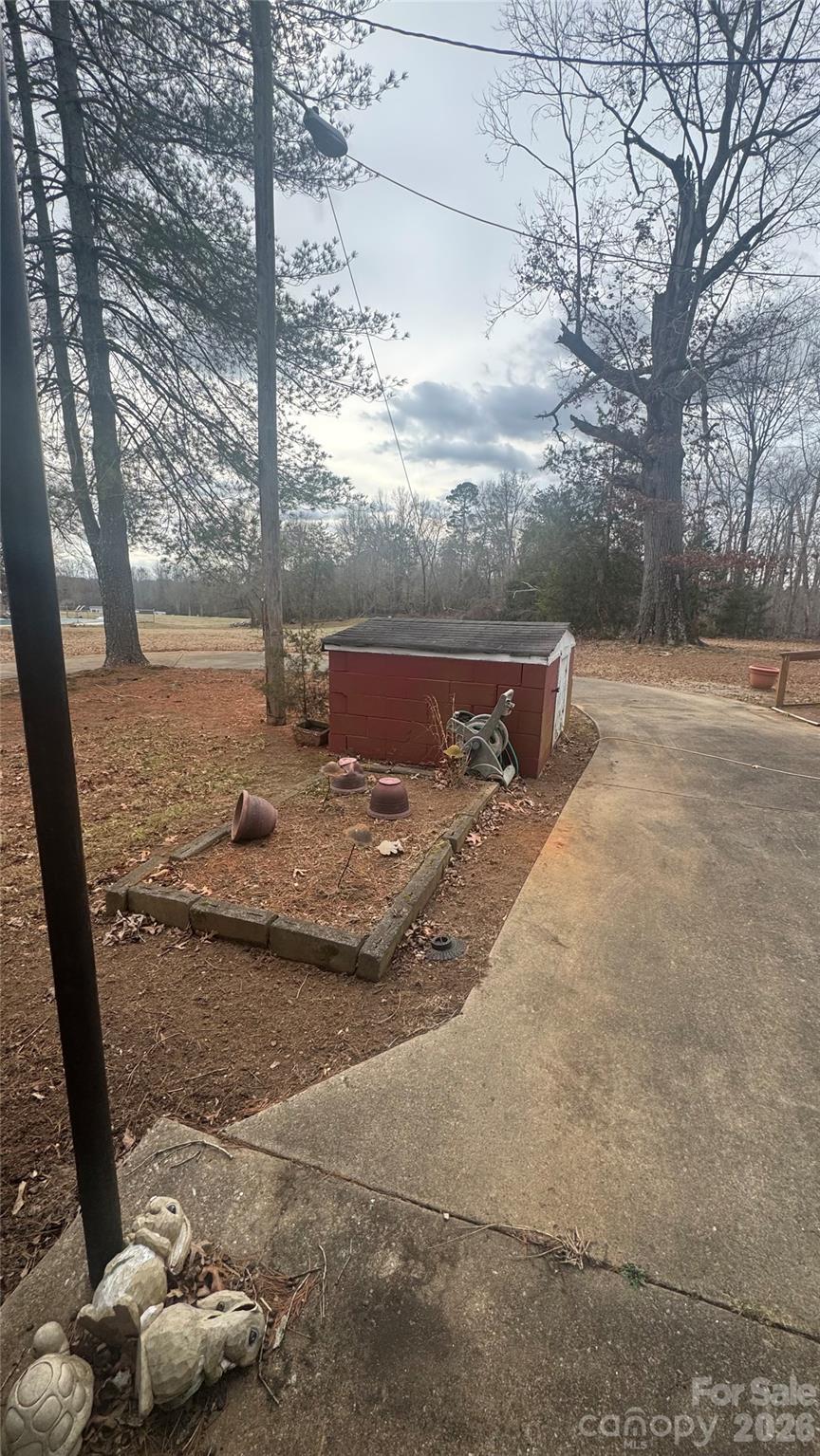 840 Skinner Road Shelby, NC 28152 - Photo 19 of 22 a view of a yard with wooden fence