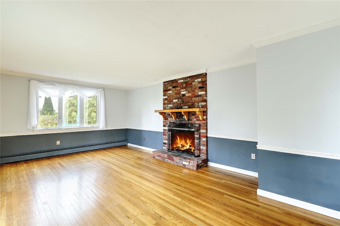 3 Pinetop Road Barrington, RI 02806 - Photo 24 of 45 Brick fireplace in family room