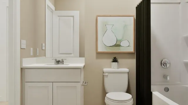 a bathroom with a sink a toilet and a bathtub