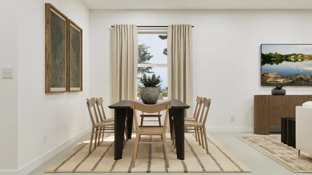 a dining room with furniture and window