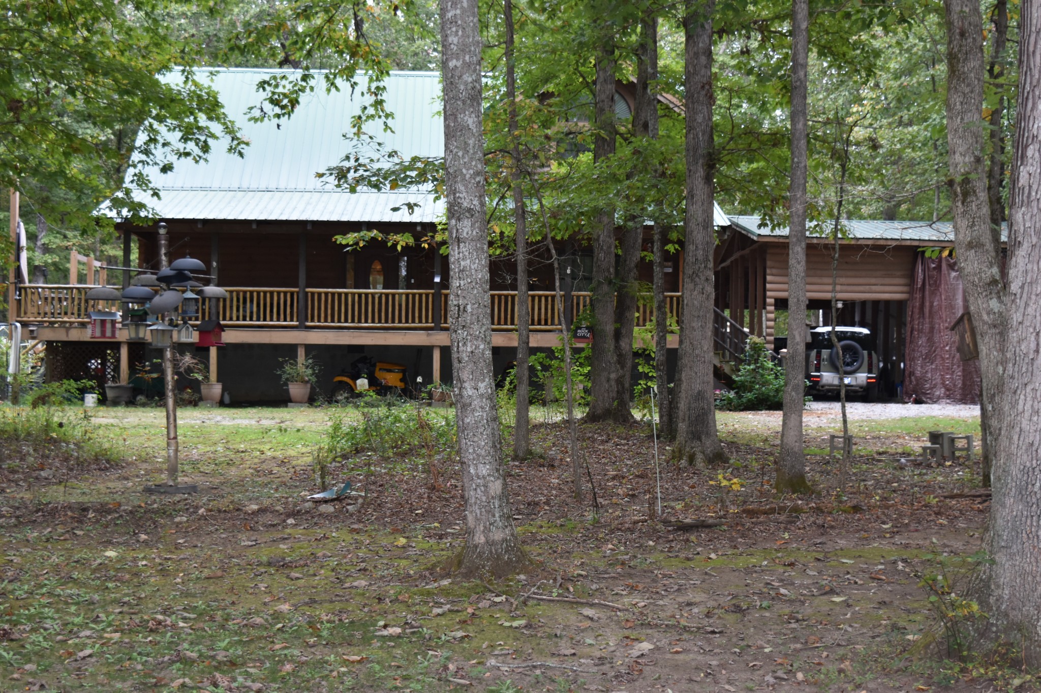 271 Ingman Clf Road Tracy City, TN 37387 - Photo 2 of 70 a backyard of a house with barbeque oven table and chairs