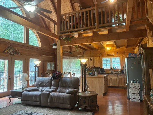 a view of a porch with a floor to ceiling window