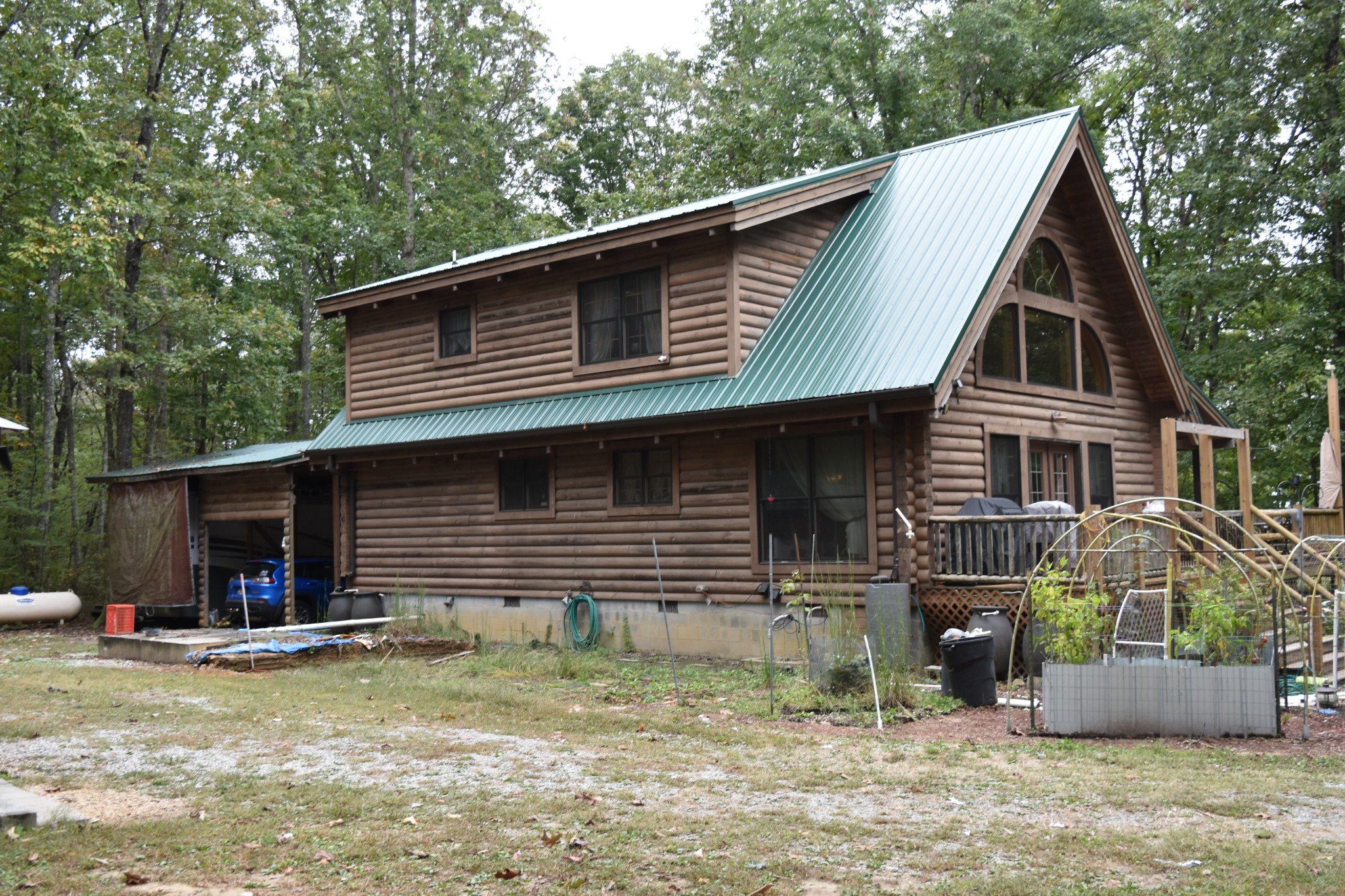 271 Ingman Clf Road Tracy City, TN 37387 - Photo 5 of 70 a front view of a house with garden