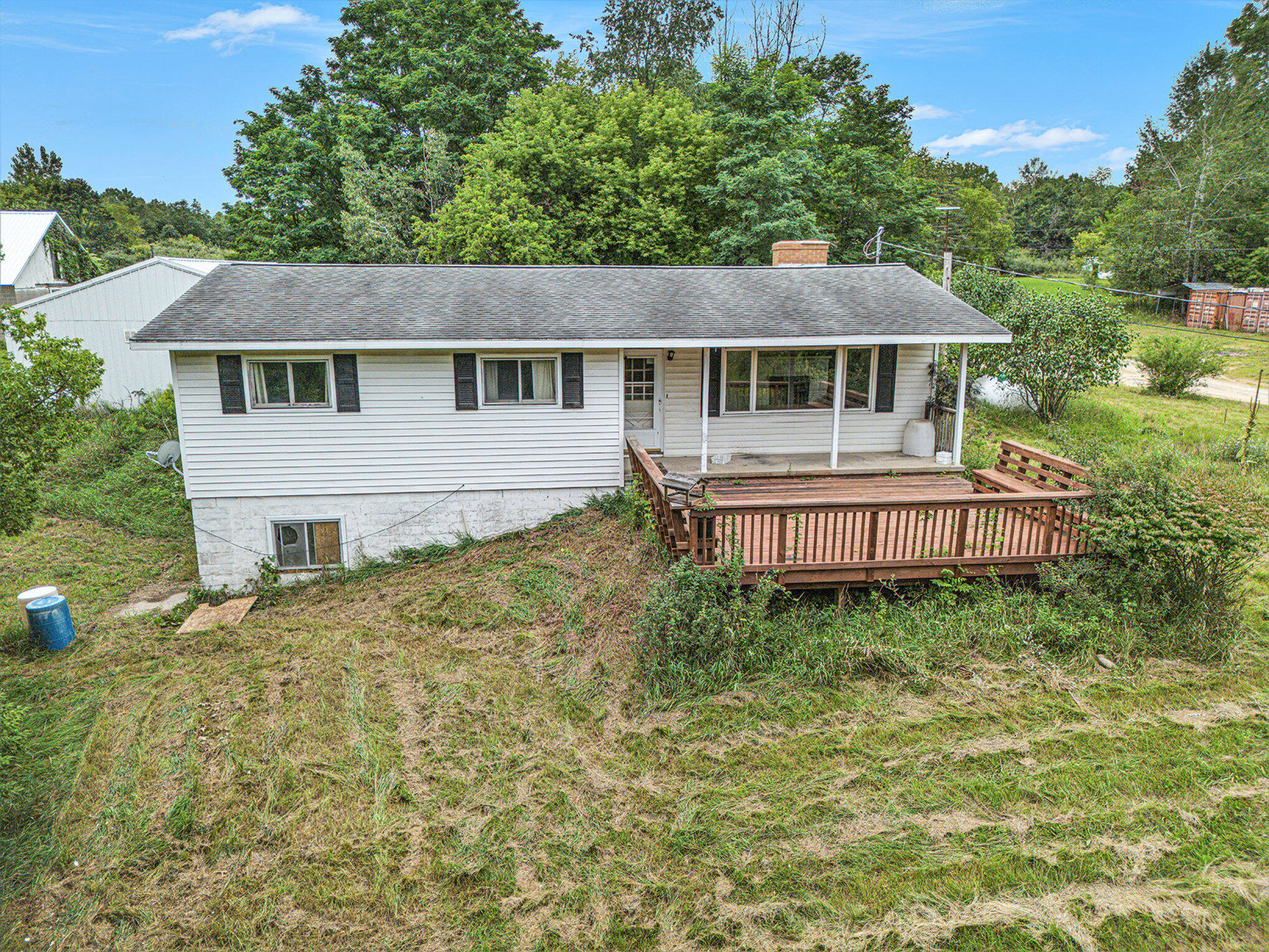1064 South Sheridan Road Stanton, MI 48888 - Photo 1 of 28 Ranch Home w Large Deck