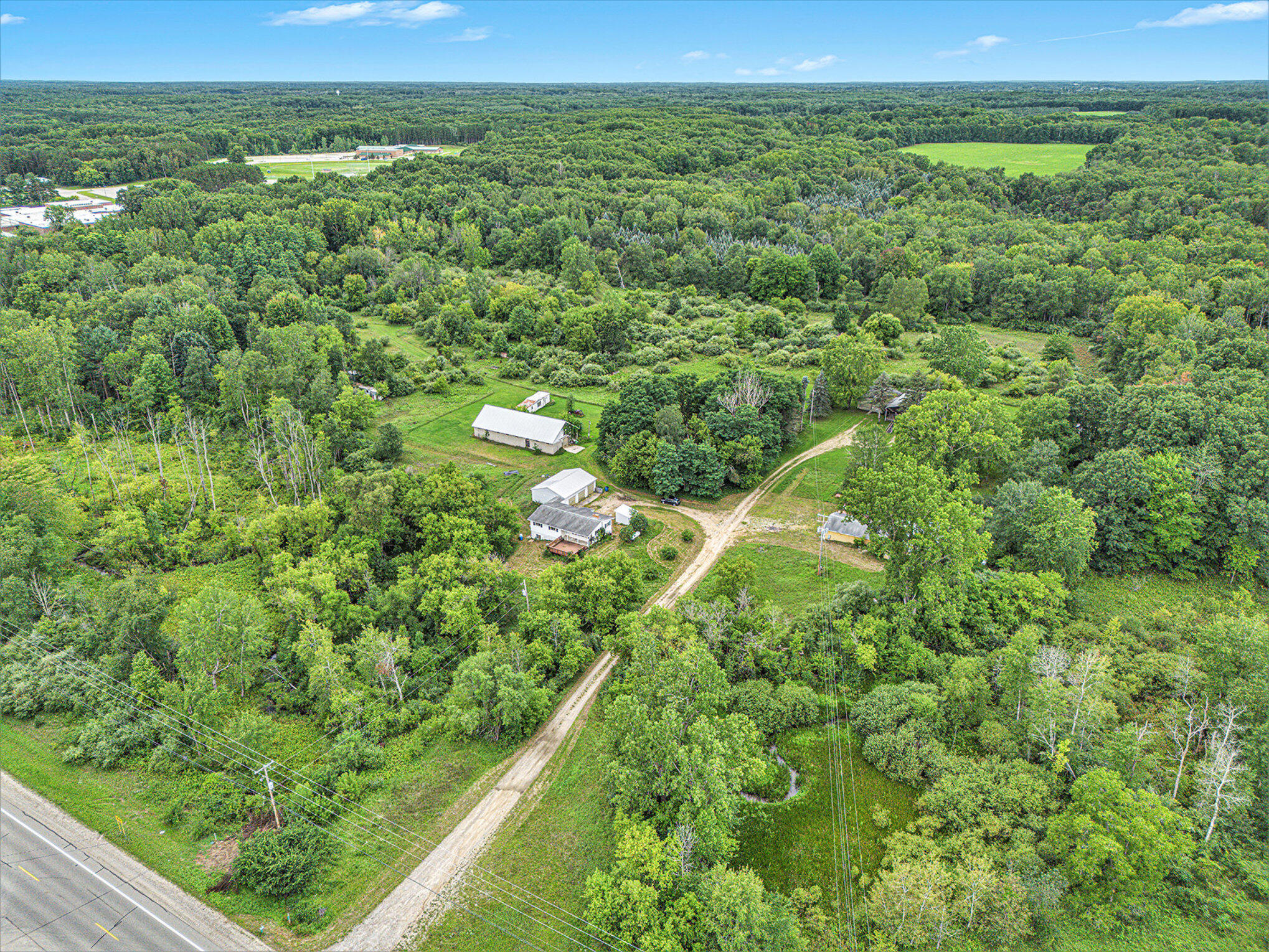 1064 South Sheridan Road Stanton, MI 48888 - Photo 25 of 28 Set Back from Road