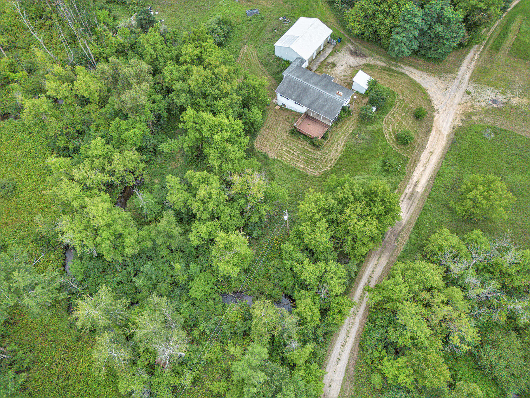 1064 South Sheridan Road Stanton, MI 48888 - Photo 27 of 28 Long Driveway