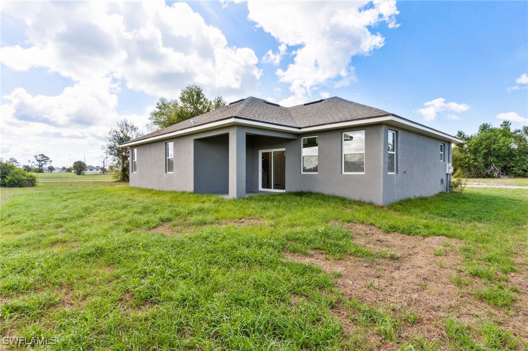 8 Cleat Court Placida, FL 33946 - Photo 23 of 24 a view of a house with a yard