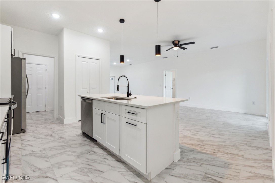 8 Cleat Court Placida, FL 33946 - Photo 7 of 24 a bathroom with a sink a vanity and a mirror