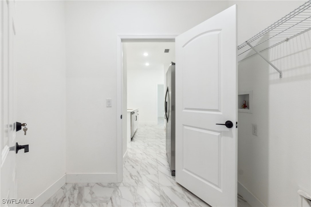 8 Cleat Court Placida, FL 33946 - Photo 8 of 24 a bathroom with a shower and a glass door