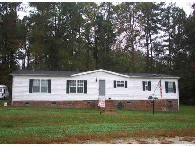 3104 Antelope Lane Raleigh, NC 27610 - Photo 1 of 1 a front view of a house with a garden