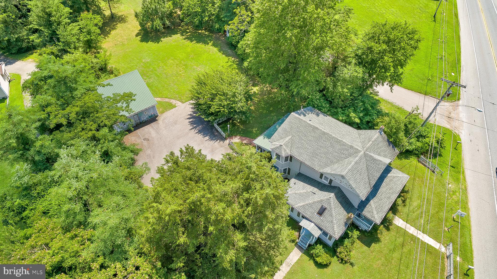 2440 Hallowing Point Road Prince Frederick, MD 20678 - Photo 3 of 51 an aerial view of a house with a yard basket ball court and outdoor seating