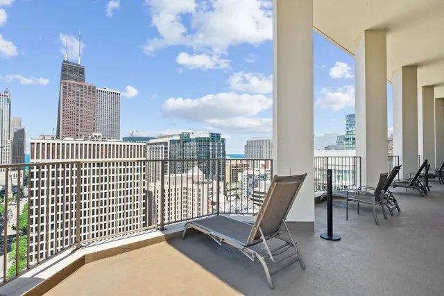 a view of a terrace with chairs
