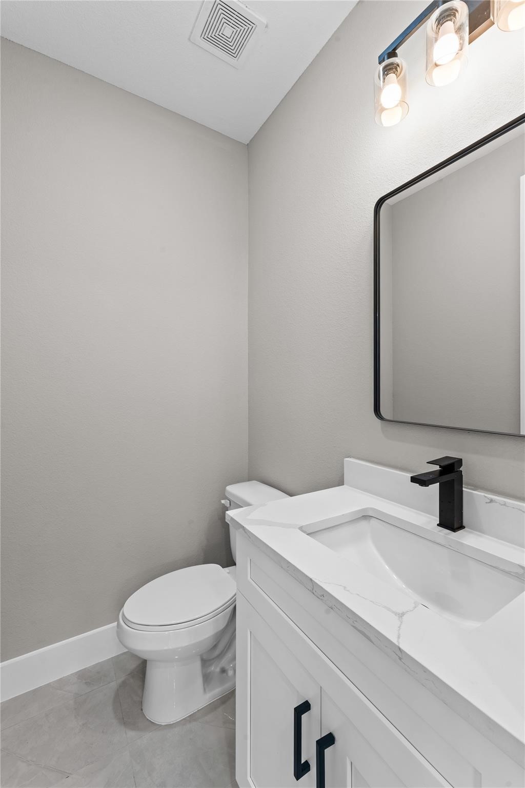 2515 Liguria Spring Spring, TX 77388 - Photo 10 of 15 a bathroom with a toilet sink and mirror