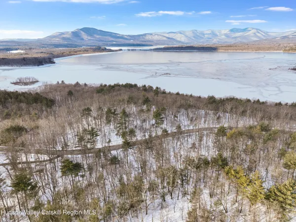 a view of lake with mountain