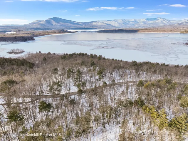 a view of lake with mountain