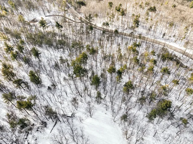 a view of an ocean and a mountain