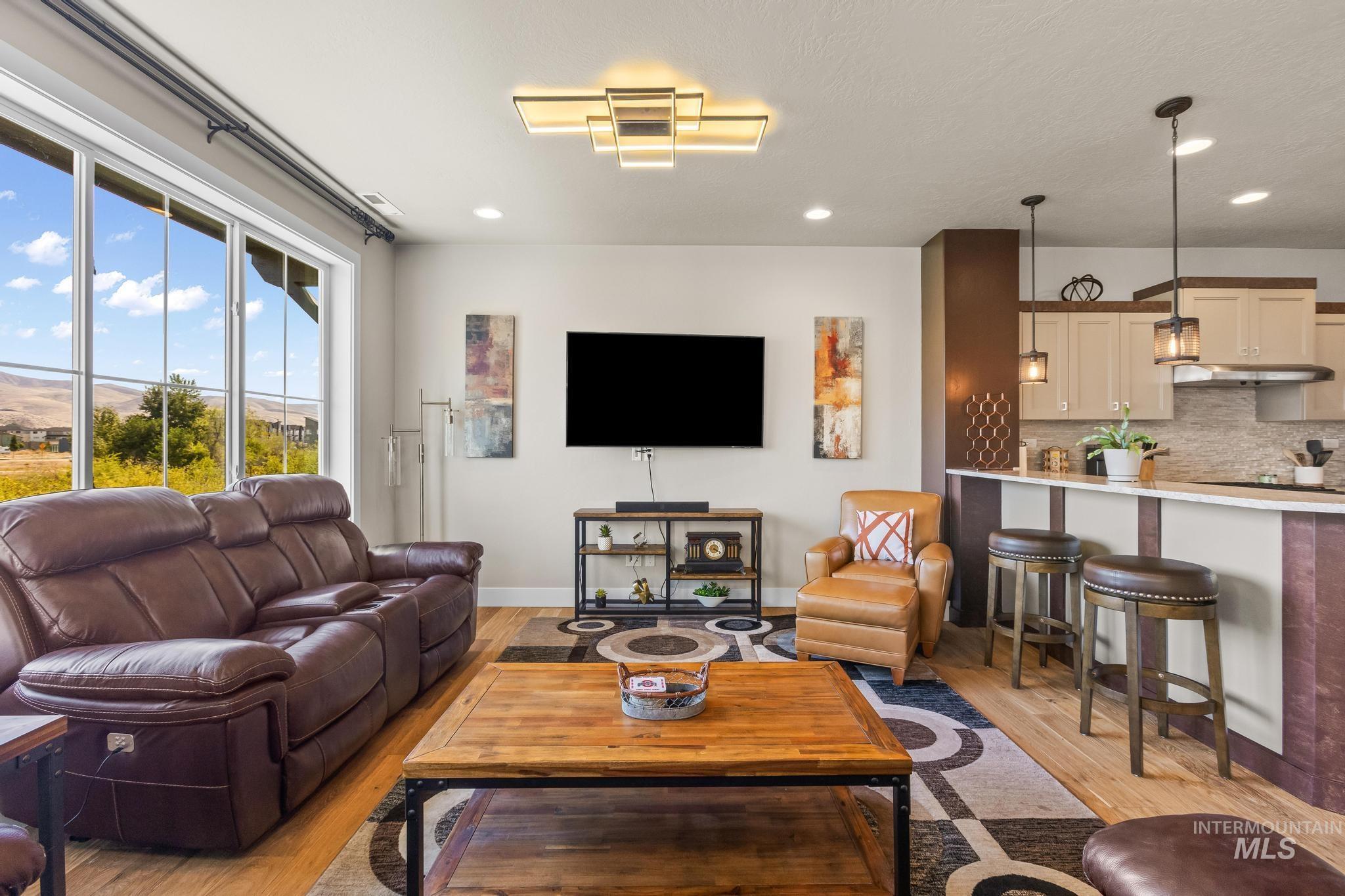 3362 East Exacta Lane Boise, ID 83716 - Photo 12 of 41 Living area with light wood finished floors and recessed lighting