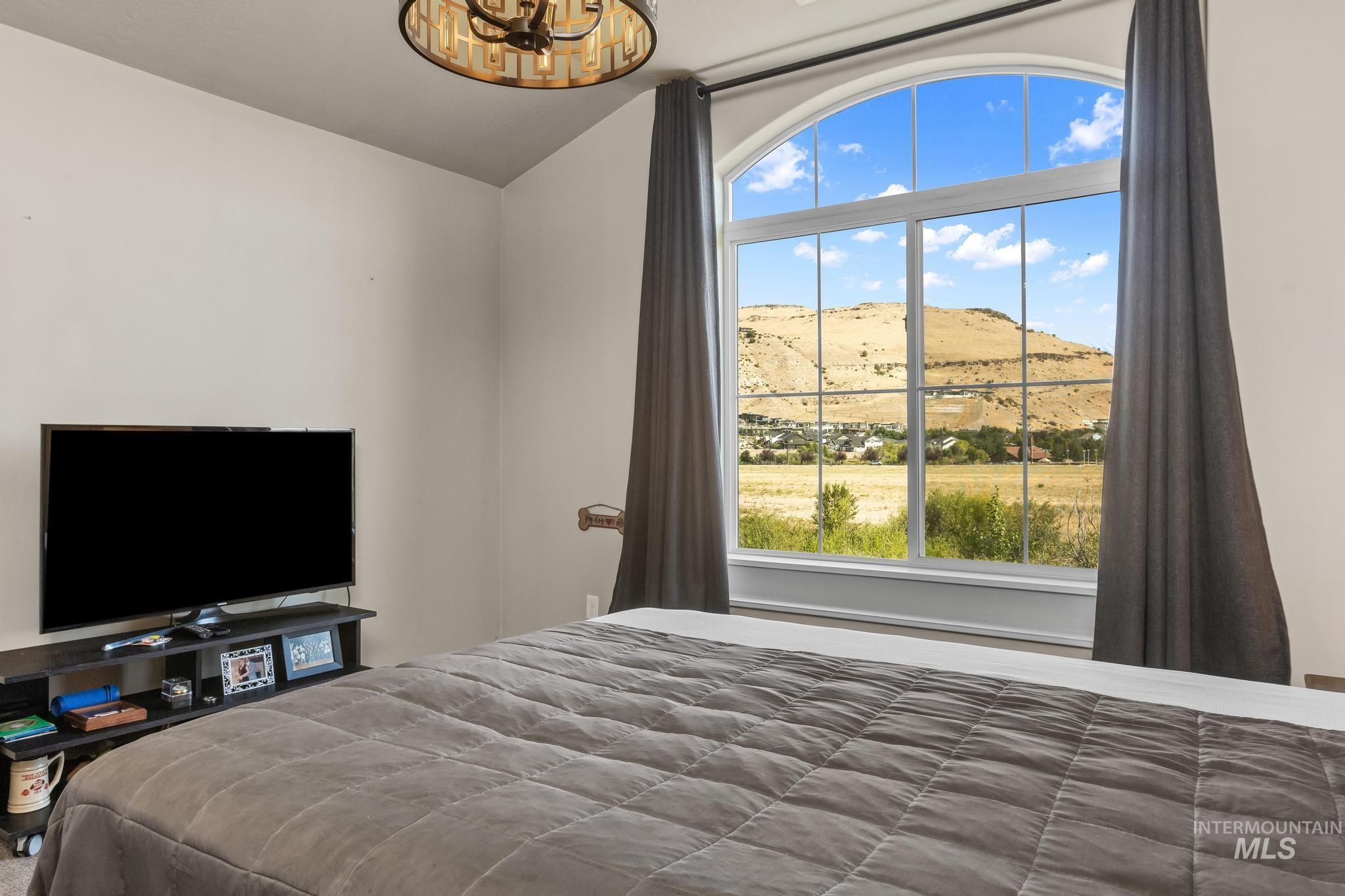 3362 East Exacta Lane Boise, ID 83716 - Photo 26 of 41 Bedroom featuring a mountain view