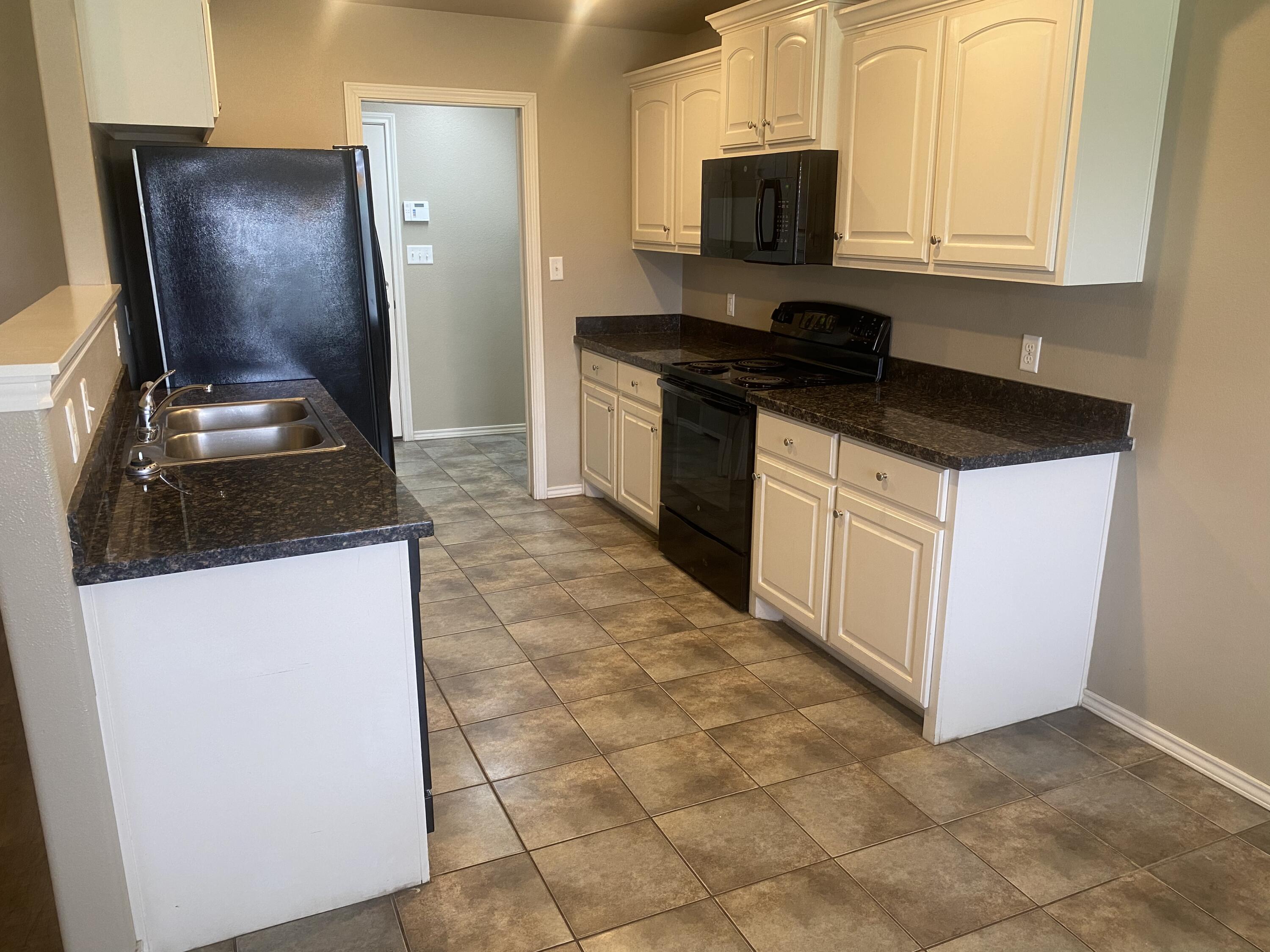 8701 12th Street Lubbock, TX 79416 - Photo 5 of 8 6572AF73-B907-4327-9C60-C03309AD6BEF