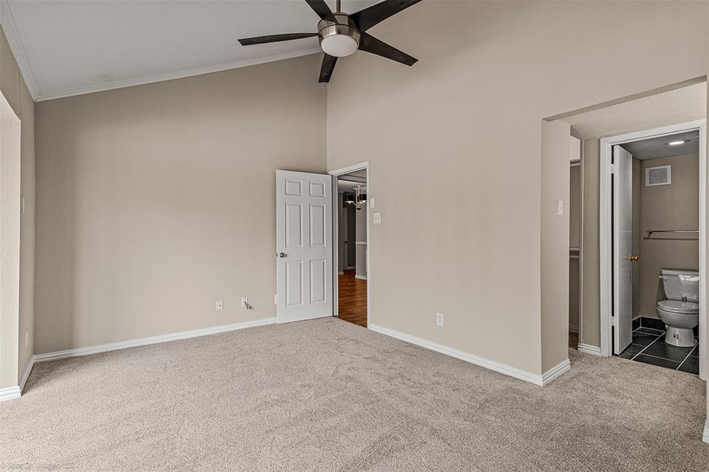 4557 North O'Connor Road, Unit 2281 Irving, TX 75062 - Photo 18 of 21 an empty room with closet and a ceiling fan