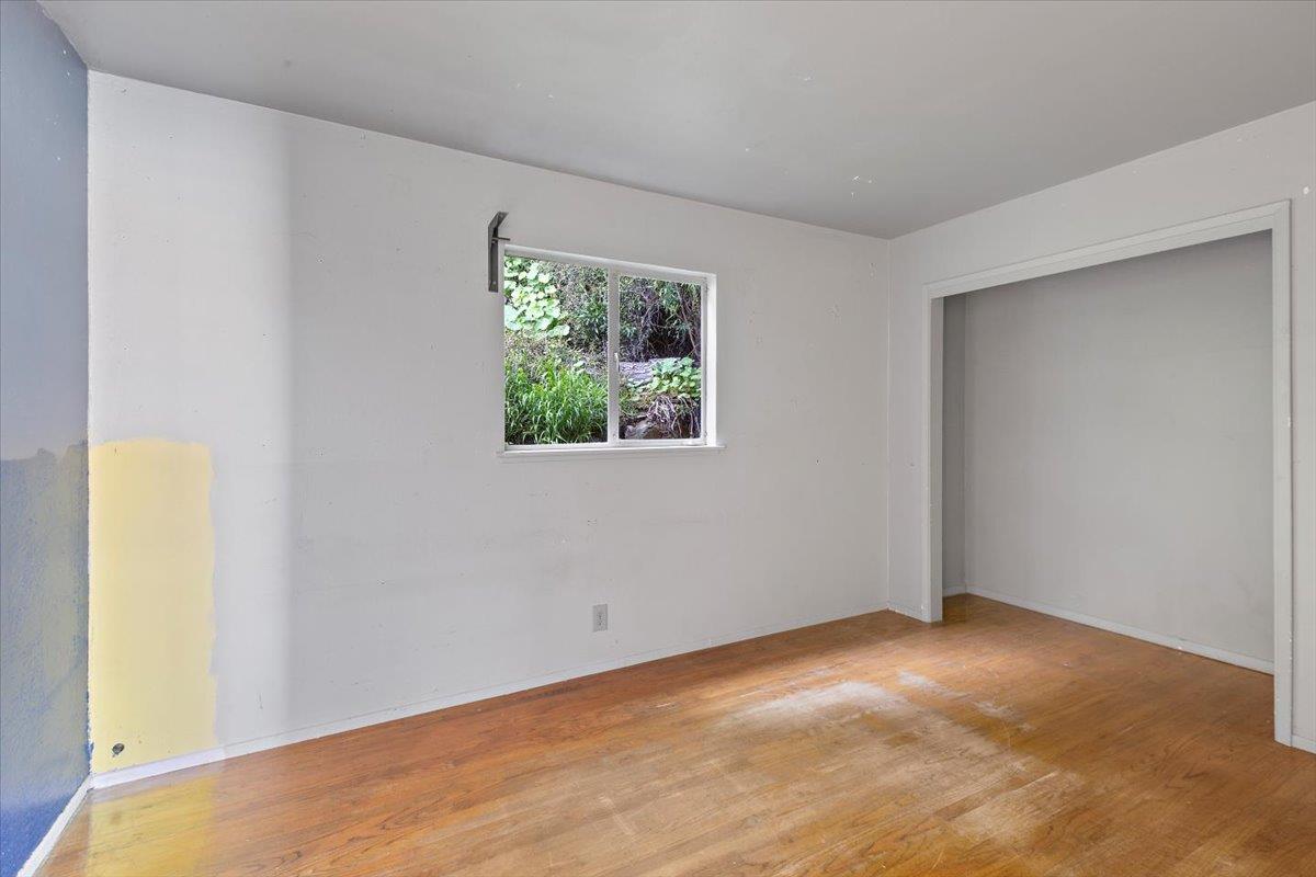 268 Olympian Way Pacifica, CA 94044 - Photo 13 of 23 a view of an empty room with a window