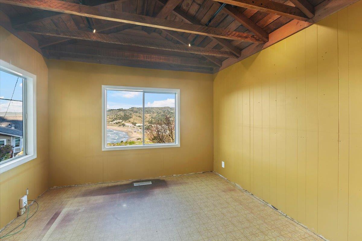 268 Olympian Way Pacifica, CA 94044 - Photo 9 of 23 a view of an empty room with a window
