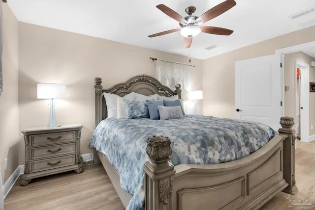 a bedroom with a bed and closet