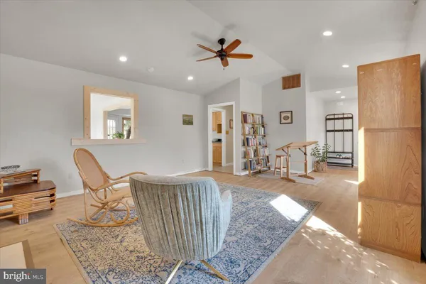 a living room with furniture and a table