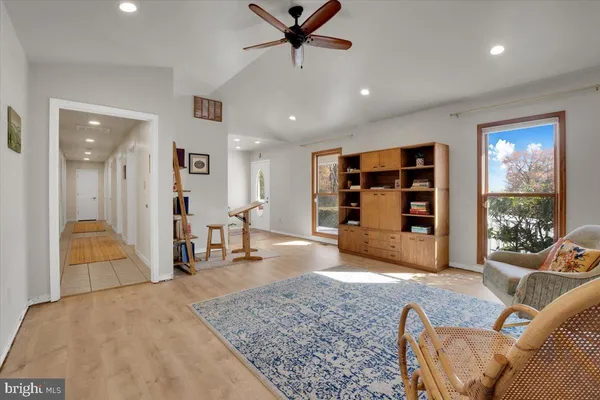 a view of a livingroom with furniture and window