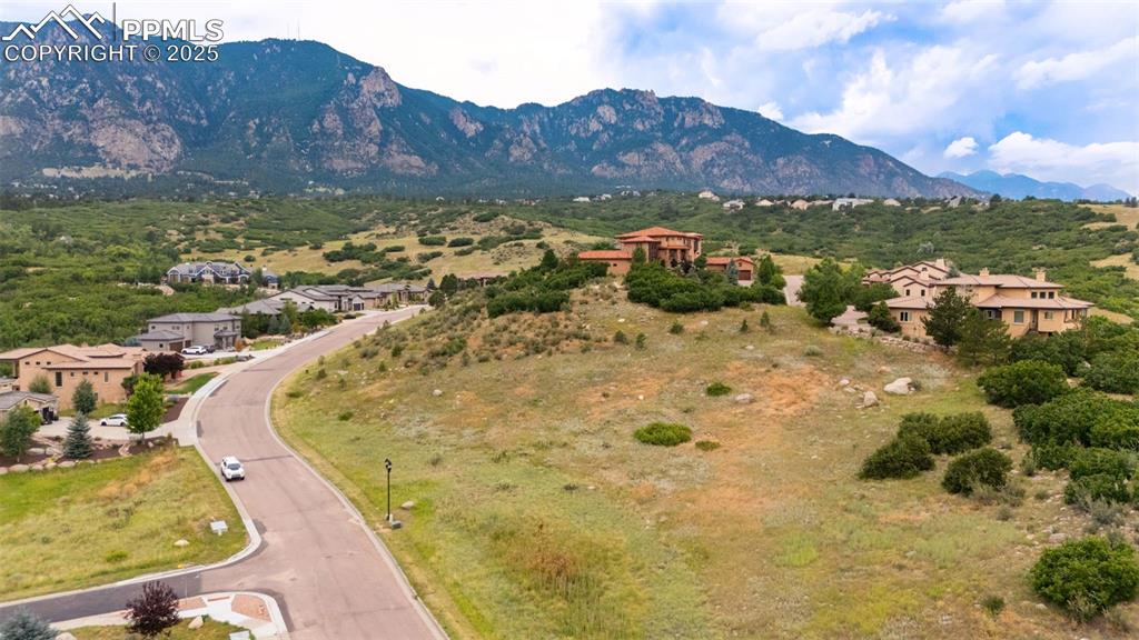 6358 Farthing Drive Colorado Springs, CO 80906 - Photo 12 of 14 a view of a lake with a mountain