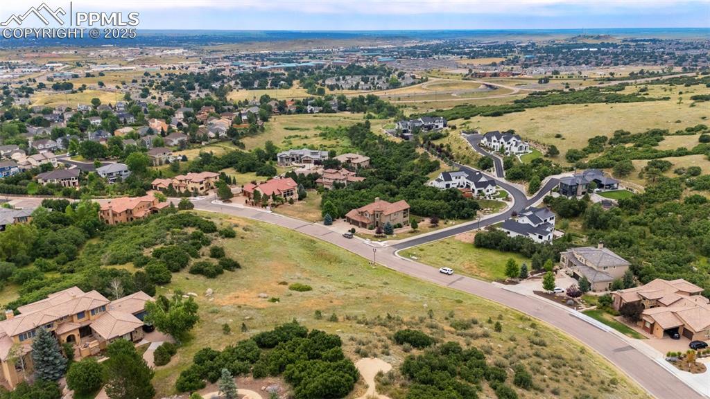 6358 Farthing Drive Colorado Springs, CO 80906 - Photo 5 of 14 an aerial view of lake and residential houses with outdoor space